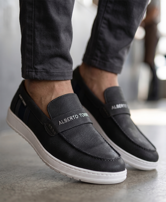 Alberto Torres Men’s Embossed Black Tech-Knit Slip-Ons