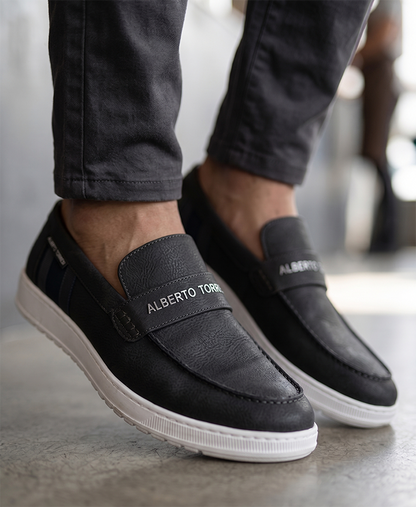 Alberto Torres Men’s Embossed Black Tech-Knit Slip-Ons