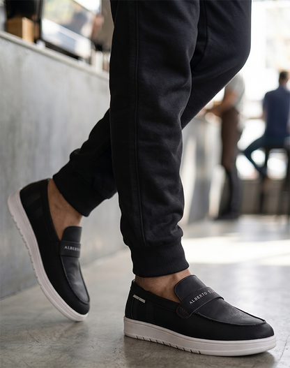 Alberto Torres Men’s Embossed Black Tech-Knit Slip-Ons